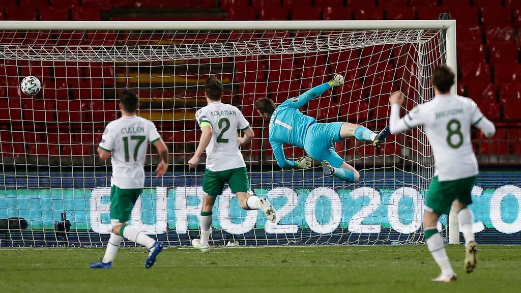 Republic of Ireland goalkeeper Mark Travers dives in vain as Serbia’s Aleksandar Mitrovic (not pictured) scores their second goal during the World Cup qualifier in Belgrade. Photograph: Novak Djurovic/PA Wire