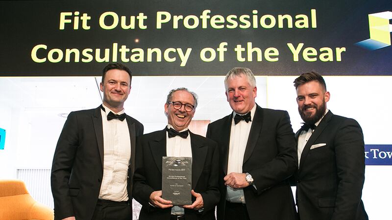Alan Coakley, MD, Ardmac presents the Fit Out Professional Consultancy of the Year award to the Turner & Townsend team