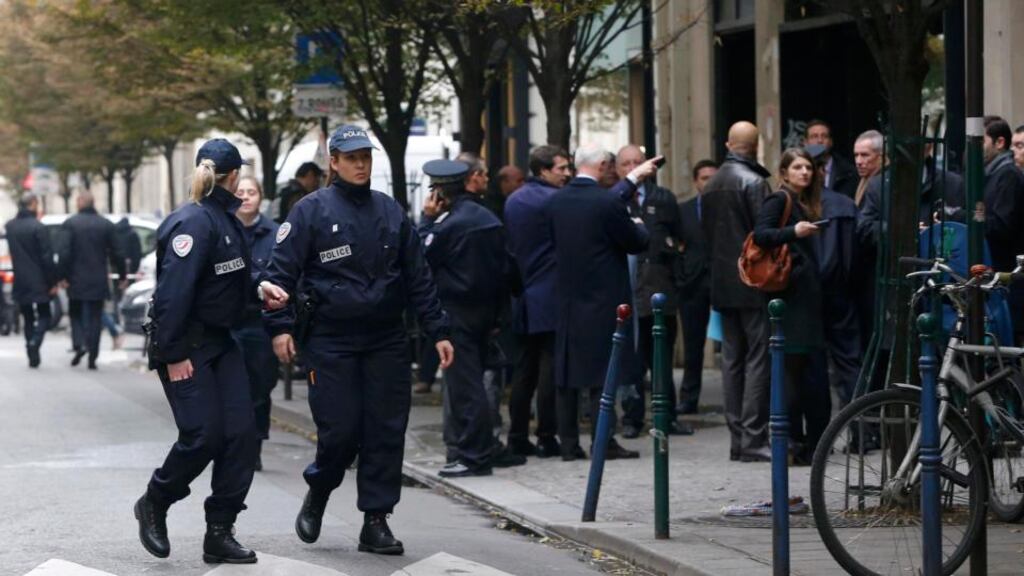 French police officers cordon the area next to newspaper Libération’s headquarters in Paris today. Photograph: Reuters