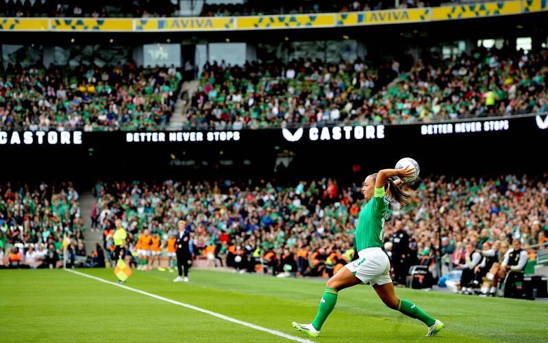 Ireland’s Katie McCabe takes a throw in. Photograph: Ryan Byrne/Inpho