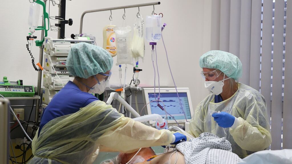 Medical staff care for a Covid-19 patient in the intensive care unit at the community hospital in Magdeburg, eastern Germany, on April 16th. Photograph: Ronny Hartmann/AFP via Getty Images