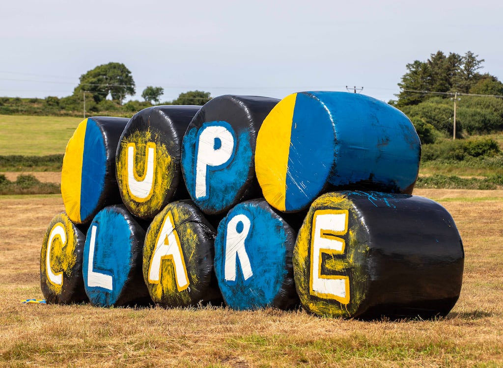 A Clare farmer near Kilrush decorated bales of hay in Clare colours ahead of the All-Ireland final against Cork. Photograph: Press 22