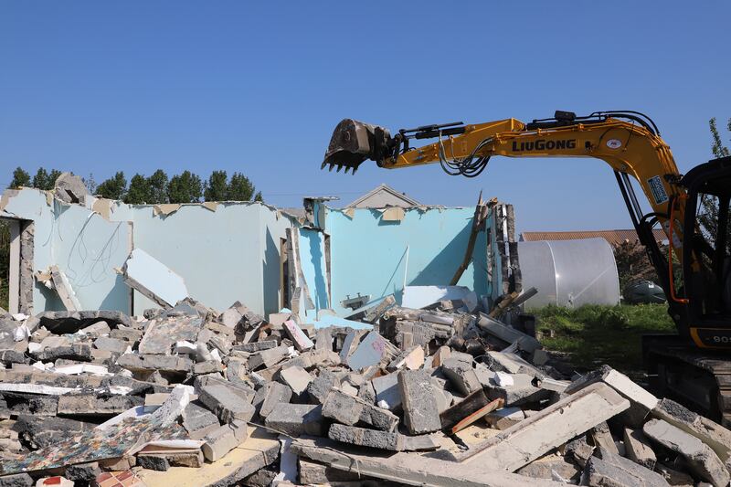 Martina Cleary's home under demolition near Crusheen, Co Clare. Photograph by Eamon Ward