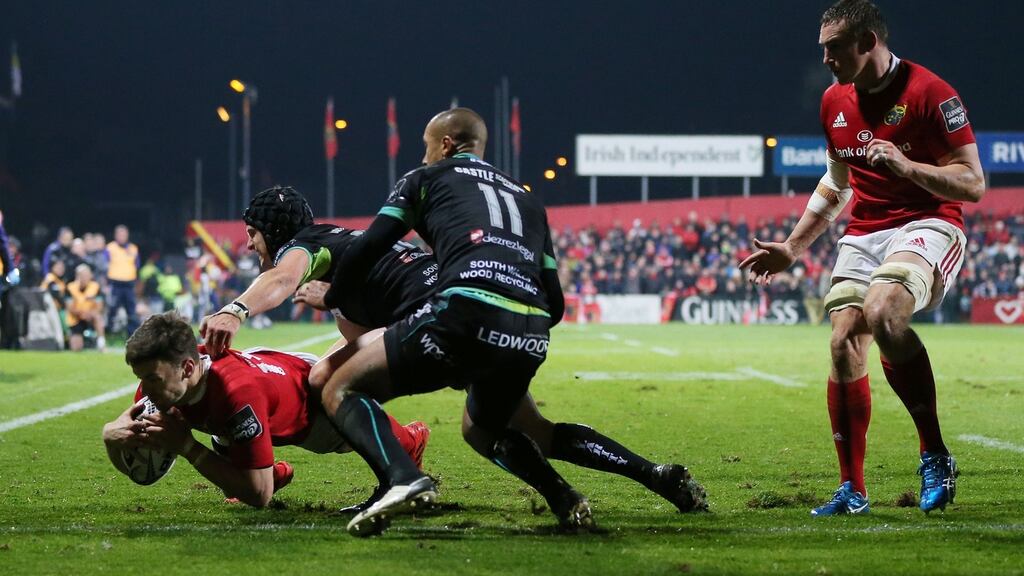 Munster’s Darren Sweetnam scores a try in their Pro12 win over Ospreys. Photo: Cathal Noonan/Inpho