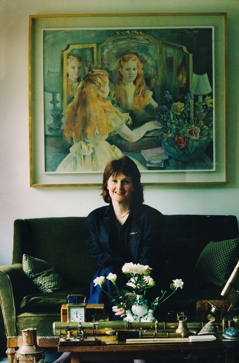 Poet Eavan Boland at her home in April 1992, with the portrait by her mother, Frances Kelly. Photograph: Joe St Leger / The Irish Times