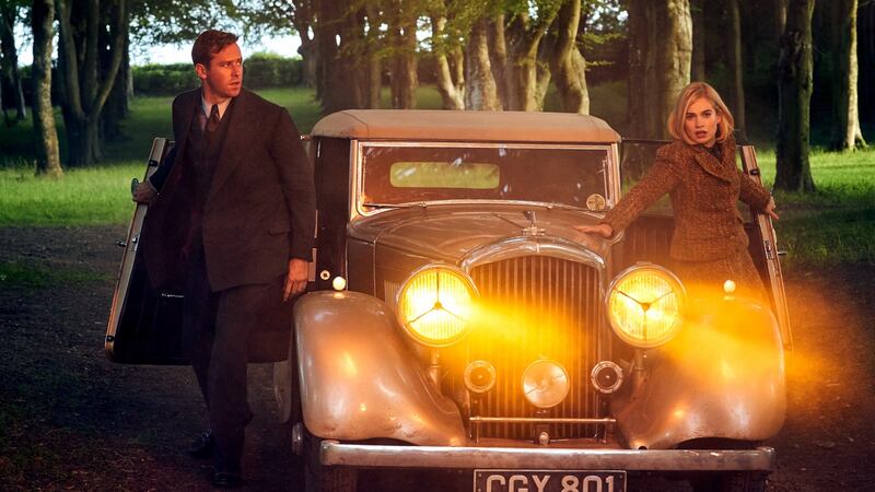 Armie Hammer and Lily James: Production required eight country houses to stand in for Manderley. Photograph: Kerry Brown/Netflix