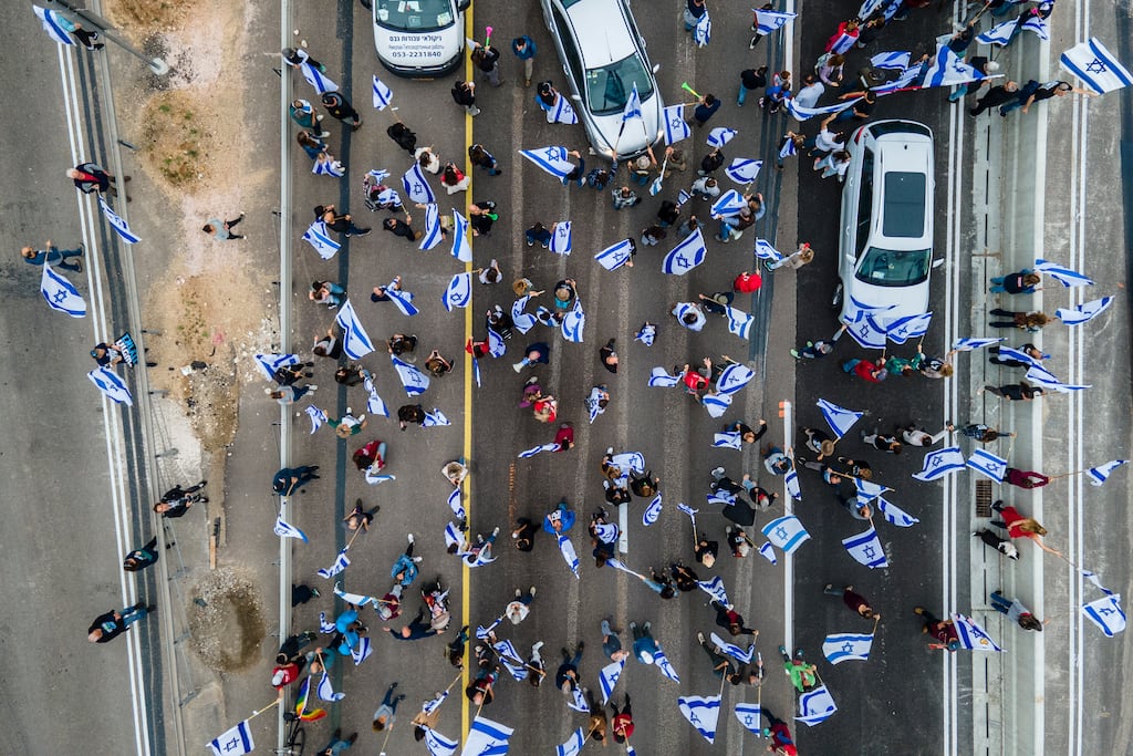 Israelis protest against plans by prime minister Binyamin Netanyahu’s government to overhaul the judicial system. Photograph: Ariel Schalit/AP