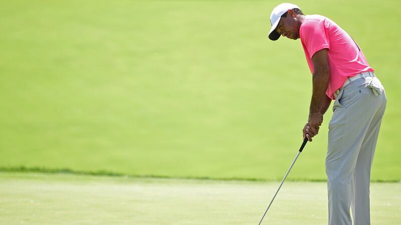 Woods’ putter let him down on the back nine on Saturday. Photo: David Dermer/AP Photo