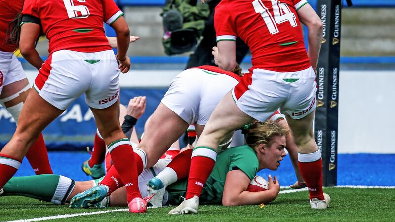 Dorothy Wall scores a try in Ireland’s Six Nations game against Wales at Cardiff Arms Park. Photograph: Robbie Stephenson/Inpho