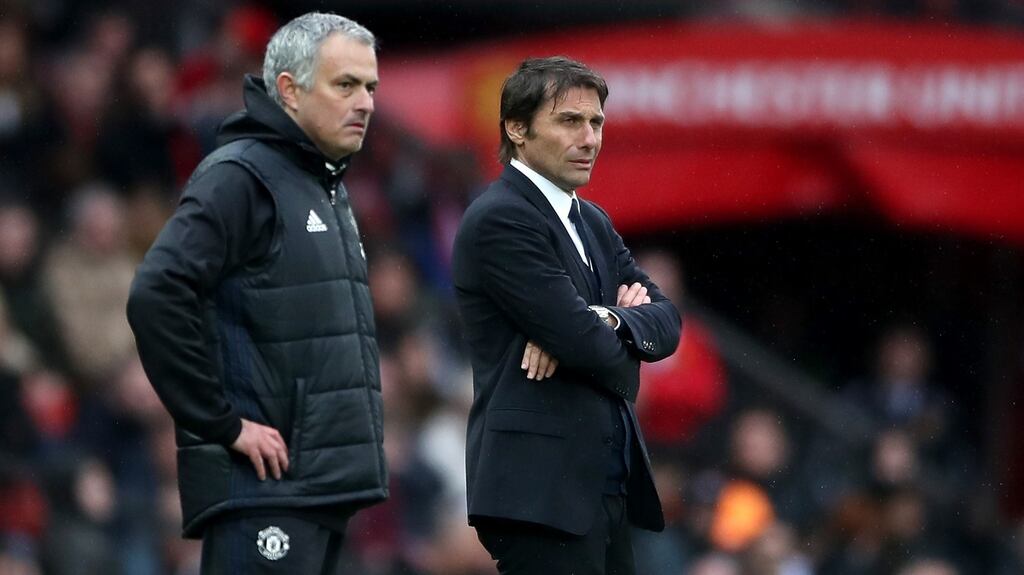 Chelsea manager Antonio Conte and Manchester United manager José Mourinho during the Premier League match at Old Trafford. Photograph: Nick Potts/PA Wire