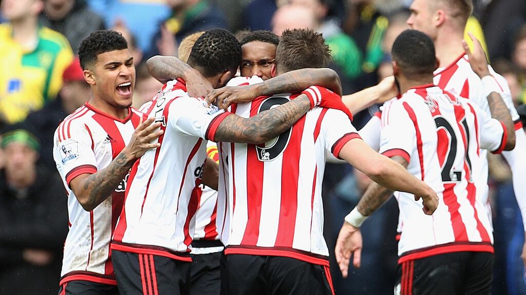 Sunderland celebrate Jermain Defoe’s second half strike in their 3-0 win over Norwich City at Carrow Road. Photograph: PA