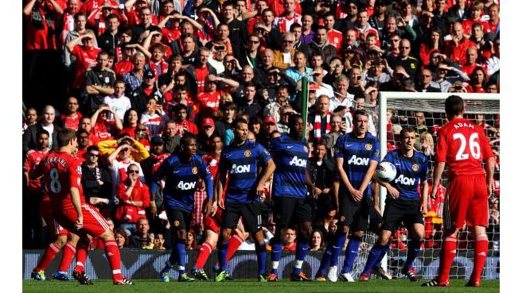 Steven Gerrard scores the opener against Manchester United on his return to the tarting line-up after seven months out. Javier Hernandez equalised for United five minutes after being introduced as a second half substitute. - (Photograph: Clive Brunskill/Getty Images)