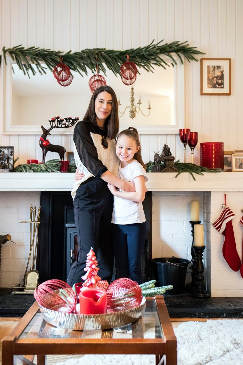 Helen Coughlan and her daughter Ava May with their decorations at home. Photograph: Clare Keogh