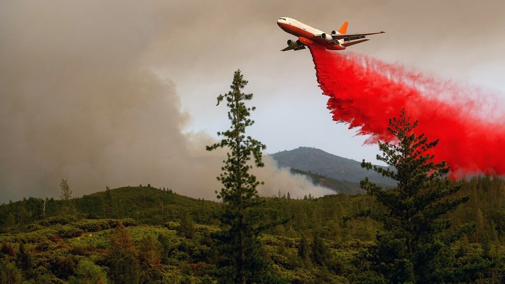 An air tanker drops retardant while battling the Ferguson fire in the Stanislaus National Forest, near Yosemite National Park on July 21st. Photograph: Noah Berger/AFP/Getty Images