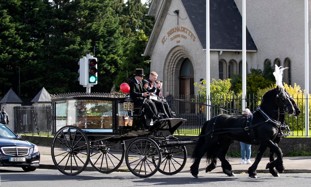 Tony Dempsey's remains were taken by horse-drawn carriage from the Crumlin church for burial at Mount Jerome Cemetery. Photograph: Colin Keegan/ Collins