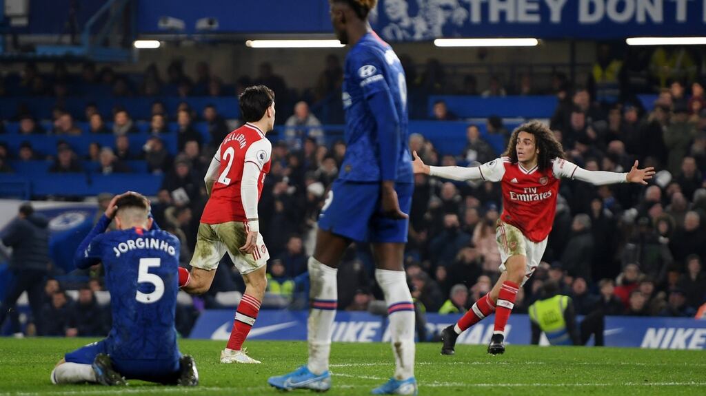 Hector Bellerin of Arsenal celebrates with Matteo Guendouzi after scoring his team’s second goal during the Premier League draw with Chelsea. Photo: Mike Hewitt/Getty Images