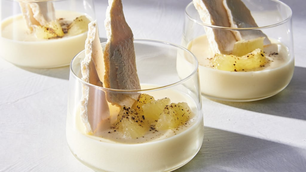 Lemon-labneh possets, finished with meringue shards and a burnt lemon powder. Photographs: Christopher Simpson/The New York Times