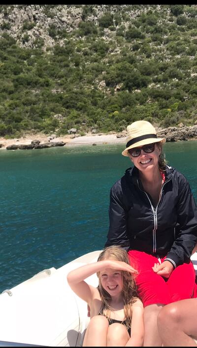 Domini and Maeve enjoying exploring secret coves on George’s little boat