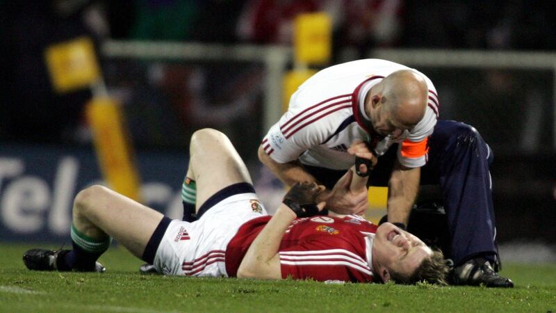O’Driscoll is treated before leaving the field with a dislocated shoulder. Photo: Hannah Johnston/Inpho