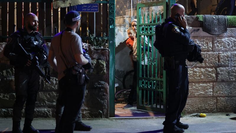 An Israeli settler closes the gate of her house during a demonstration in the Sheikh Jarrah neighbourhood of occupied East Jerusalem on May 5th. Photograph: Emmanuel Dunand/AFP via Getty Images