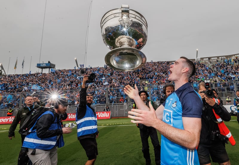 Brian Fenton celebrates with the Sam Maguire cup. Photograph: James Crombie/Inpho