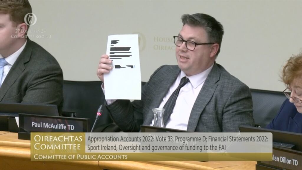 Paul McAuliffe holds up a heavily redacted letter at the Public Accounts Committee (PAC) on Thursday, February 22nd, 2024