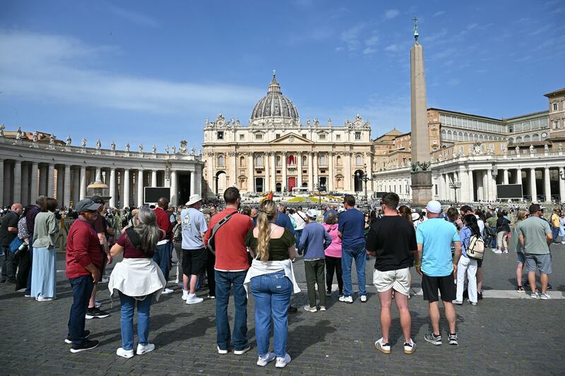 People gather at St Peter's square following the death of Pope Francis. Photograph: Alberto Pizzoli/Getty Images