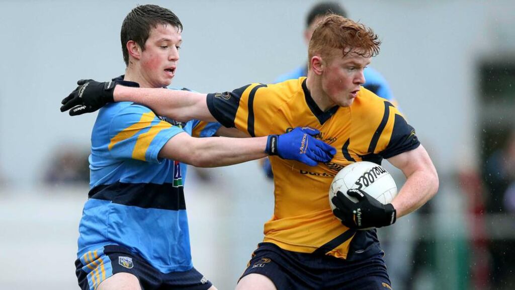Ryan Wylie of UCD with Conor McHugh of DCU in the Sigerson Cup semi-final. McHugh features in Dublin’s U21 squad. Photograph: Donall Farmer/Inpho