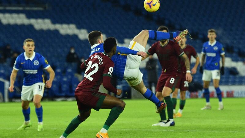 Aaron Connoly tries an overhead kick against Wolves. Photograph: Glyn Kirk/Getty/AFP