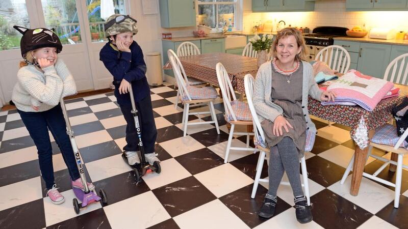Jane Carroll with her children, Lucy (12) and Will (9), in her kitchen at Blackrock, Co Dublin. Photograph: Eric Luke