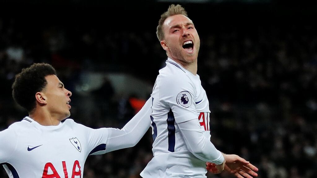 Tottenham’s Christian Eriksen celebrates with Dele Alli after scoring their first goal in the Premier League game against Manchester United at Wembley Stadium. Photograph: Eddie Keogh/Reuters