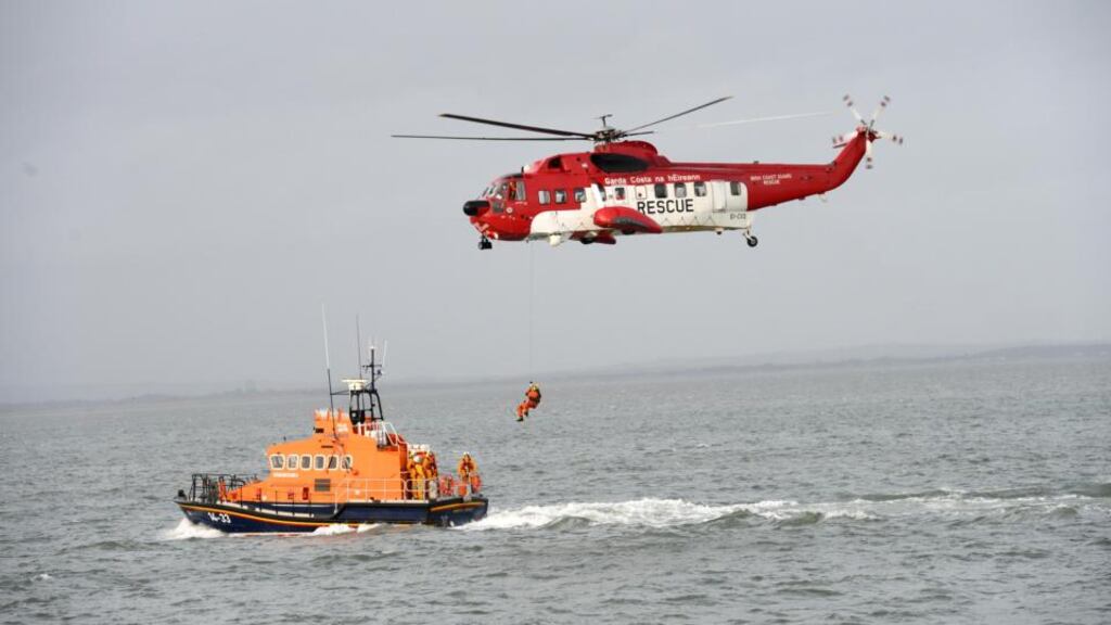 File photograph of an Irish Coast Guard rescue. A helicopter airlifted two teenagers to safety today after they became stranded on rocks off the coast of Greystones. Photograph: Dara Mac Donaill/The Irish Times