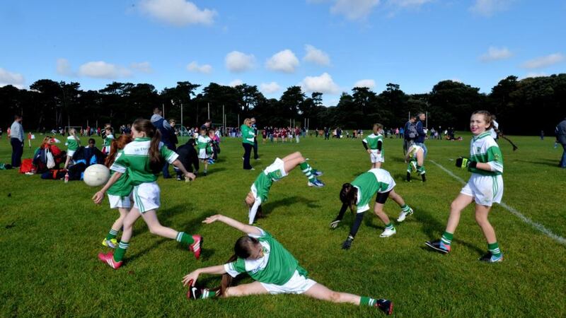 Members of the O’Tooles U10s limber up. Photograph: Alan Betson