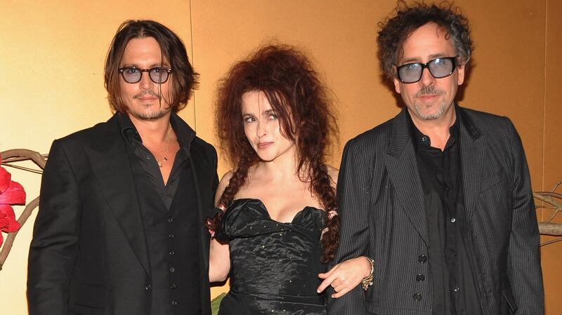Actors Johnny Depp and Helena Bonham Carter, and director Tim Burton in New York City in 2009. Photograph: Jamie McCarthy/WireImage