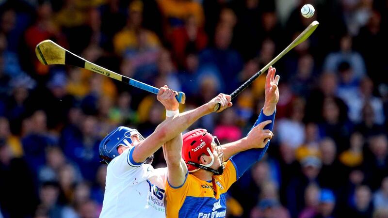 John Conlon of Clare challenges for possession with Waterford’s Conor Prunty during the Munster SHC round-robin game at Walsh Park. Photograph: Ryan Byrne/Inpho