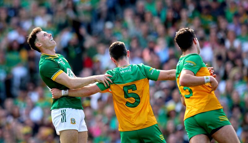 Meath’s Jordan Morris, left, reacts to a missed chance in the All-Ireland semi-final against Donegal on Sunday. Photograph: Ryan Byrne/INPHO