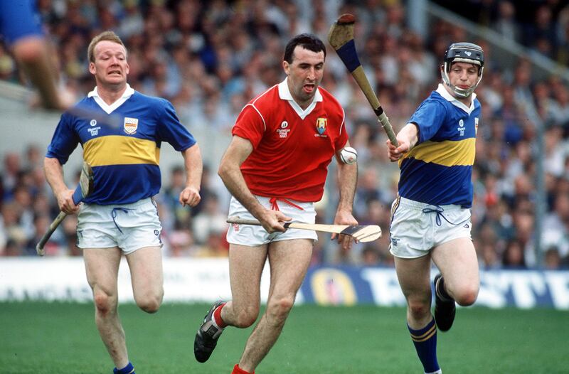 Cork's Ger Fitzgerald takes the game to Tipperary in the 1990 Munster hurling final. Photo: Inpho