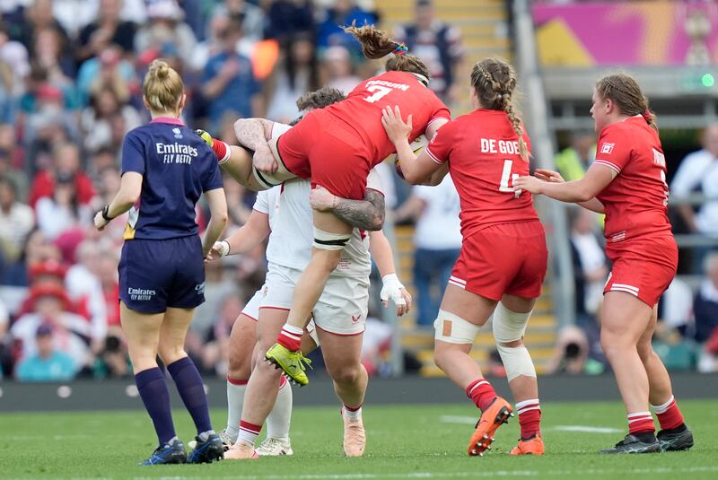 England's Hannah Botterman tackles Canada's Karen Paquin, leading to a yellow card for the England prop. Photograph: Andrew Matthews/PA