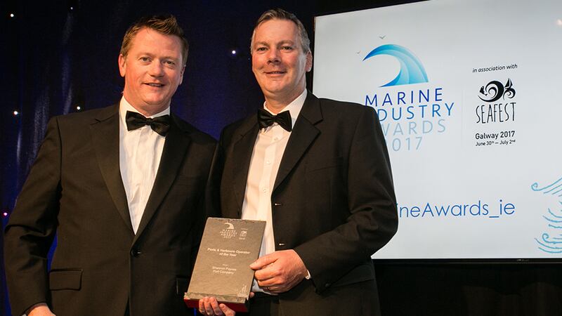 Declan McDonald, Partner, PwC presents the Ports & Harbours Operator of the Year award to Pat Keating, Shannon Foynes Port Company.