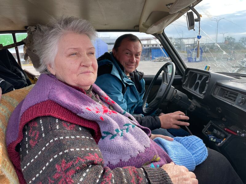 Klavdiya Pivovar and friend Yevhen Shaulskyi set off from Kharkiv in northeastern Ukraine for their home village of Mospanove, 70km away. Klavdiya's husband, Petro, is in the back seat. Photograph: Daniel McLaughlin