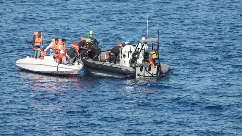 LÉ Eithne crew responding to a distress call from a migrant boat in the Mediterranean. Photograph: Irish Defence Forces/Flickr