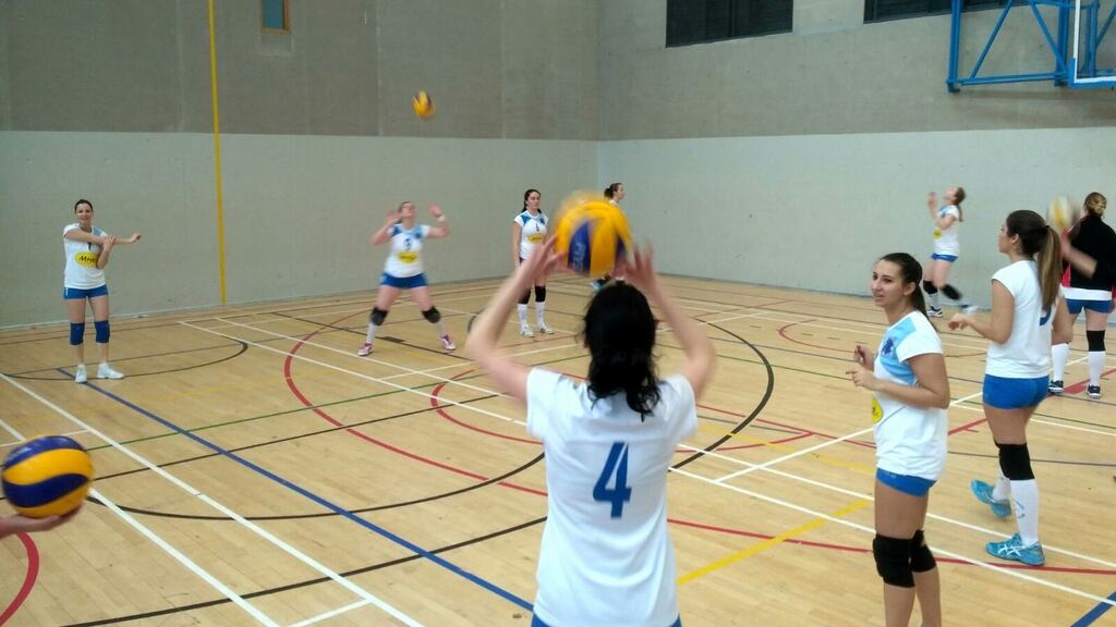 The Garda Volleyball Club women’s team at training in in the sports hall of Coláiste na hÍde in Tallaght.