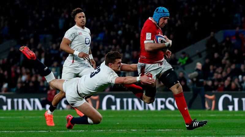 Justin Tipuric finishes off a stunning try for Wales early in the second-half. Photograph: Adrian Dennis/Getty/AFP