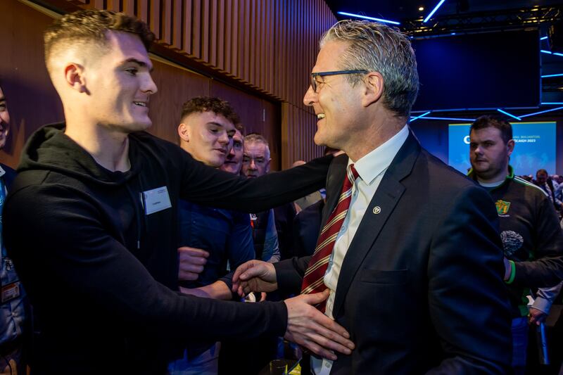 GAA president-elect Jarlath Burns is congratulated on his election by his son Jarlath Óg Burns. Photograph: Morgan Treacy/Inpho