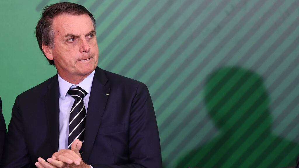 Brazil’s president, Jair Bolsonaro, promised to end demarcation of new indigenous lands, reduce the power of environmental agencies and free up mining and commercial farming on indigenous reserves. Photograph: Evaristo Sa/AFP/Getty Images