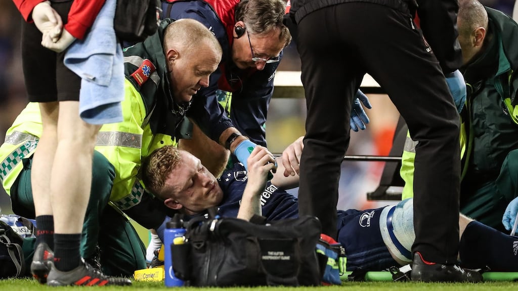 Leinster’s Dan Leavy receives treatment  after he was injured during the Champions Cup quarter-final clash with Ulster. Photo: Billy Stickland/Inpho