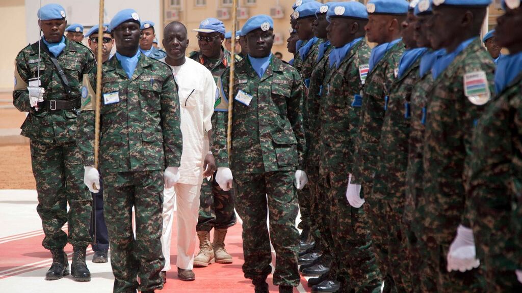 Ambassador Bulus Paul Zom Lolo of Nigeria, head of the African Union (AU) Peace and Security Council, inspects an honor guard at the UNAMID headquarters in El Fasher, North Darfur today. Photograph: Reuters