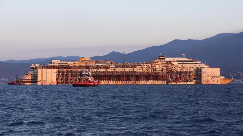 The Costa Concordia in front of Genoa’s port. Photograph: EPA