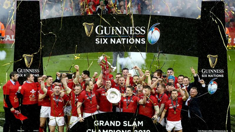 Wales celebrate after securing the 2019 Grand Slam with victory over Ireland. Photograph: Bryan Keane/Inpho