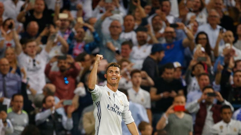 Ronaldo celebrates after completing his hat-trick. Photograph: Paul Hanna/Action Images via Reuters/Livepic